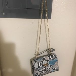 Snake patterned purse